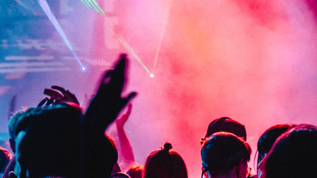 crowd with hands in the air