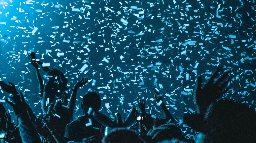 confetti falling over a crowd of people